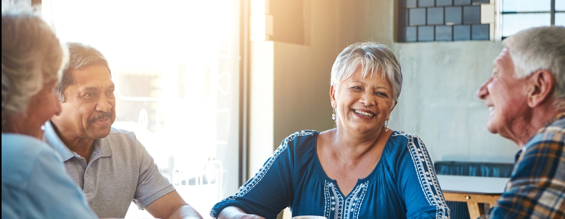 a group of people sitting at a table